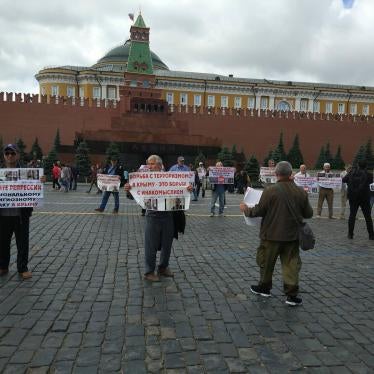 Crimean Tatar activists protest politically motivated arrests of terrorism charges in Moscow’s Red Square on July 10, 2019.