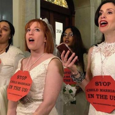 Massachusetts Child Marriage Survivor Tammy Monteiro joins coalition members in chain in protest at State House to end child marriage