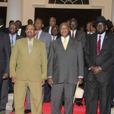 Former Vice President of South Sudan Riek Machar, Sudan's President Omar al-Bashir, Uganda's President Yoweri Museveni, South Sudan's President Salva Kiir, and Uganda's Foreign Affairs Minister Sam Kutesa pose for a photograph as they meet at State House 