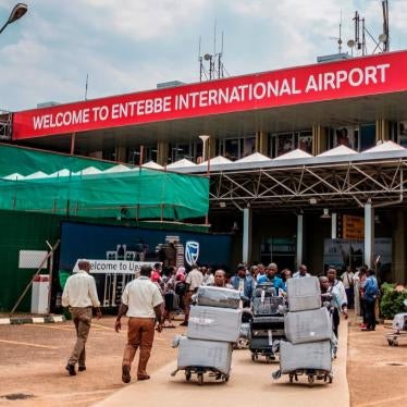 Passengers arriving on international flights leave the international arrivals lobby after they have been screened and cleared for any symptoms of the novel coronavirus at Entebbe Airport on March 3, 2020.