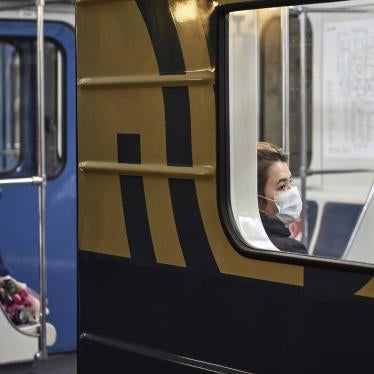 A woman wearing face mask sits in the train at the subway during the mandatory self-isolation amid coronavirus disease outbreak, in Moscow, Russia, April 2020.