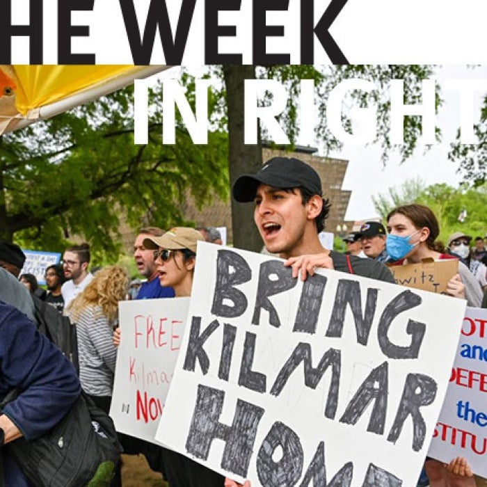 Protesters hold sign reading "Bring Kilmar Home".